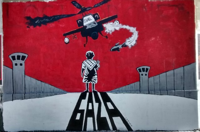 Mural de la Juventud Guevarista contra el bombardeo israelí